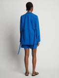 Back image of model wearing Cotton Linen Blazer in cerulean
