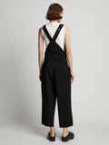 Back image of model wearing Drapey Suiting Wide Leg Jumpsuit in black