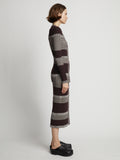 Side image of model wearing Mini Stripe Button Front Skirt in dark brown/off white