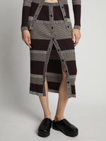 Detail image of model wearing Mini Stripe Button Front Skirt in dark brown/off white