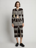 Front image of model wearing Mini Stripe Cardigan in dark brown/off white