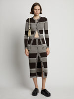 Front image of model wearing Mini Stripe Cardigan in dark brown/off white