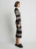 Side image of model wearing Mini Stripe Cardigan in dark brown/off white