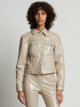 Cropped front image of model wearing Vinyl Cropped Jacket in fawn
