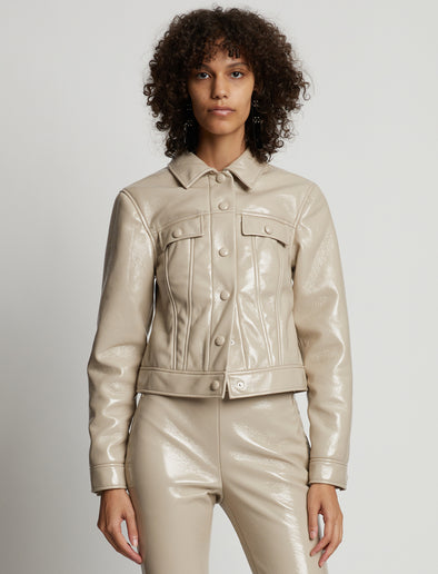 Cropped front image of model wearing Vinyl Cropped Jacket in fawn