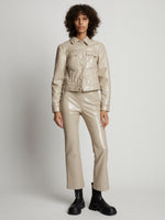 Front image of model wearing Vinyl Cropped Jacket in fawn