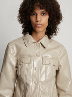 Detail image of model wearing Vinyl Cropped Jacket in fawn