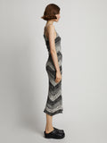 Side image of model wearing Marled Stripe Knit Maxi Dress in buttercream/black