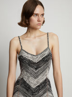 Detail image of model wearing Marled Stripe Knit Maxi Dress in buttercream/black