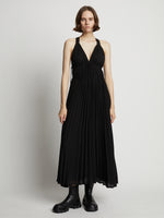Front image of model wearing Broomstick Pleated Tank Dress in black