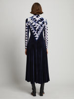 Back image of model wearing Tie Dye Velvet Dress in midnight multi