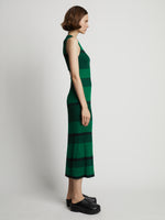 Side image of model wearing Mini Stripe Sleeveless Knit Dress in green/black