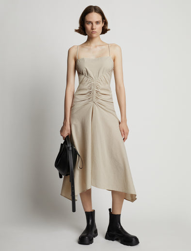 Front image of model wearing Gingham Ruched Strappy Dress in buttercream/fawn