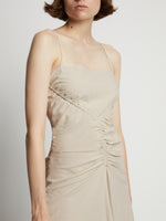 Detail image of model wearing Gingham Ruched Strappy Dress in buttercream/fawn
