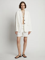 Front image of model wearing Cotton Linen Shorts in off white