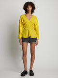 Front image of model wearing Poplin V-Neck Top in sun
