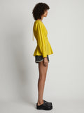 Side image of model wearing Poplin V-Neck Top in sun