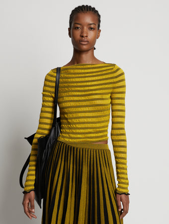 Cropped front image of model wearing Sheer Stripe Sweater in sulphur/black