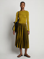 Front image of model wearing Sheer Stripe Sweater in sulphur/black