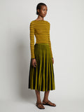 Side image of model wearing Sheer Stripe Knit Skirt in sulphur/black