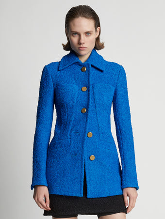 Cropped front image of model wearing Boucle Tweed Jacket in turquoise