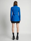 Back image of model wearing Boucle Tweed Jacket in turquoise