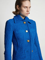 Detail image of model wearing Boucle Tweed Jacket in turquoise