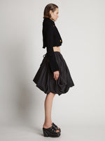 Side image of model wearing Boucle Tweed Crop Jacket in black