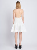 Back image of model wearing Stretch Nylon Dress in white