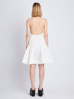 Back image of model wearing Stretch Nylon Dress in white
