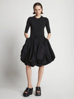 Front image of model wearing Technical Nylon Skirt in black