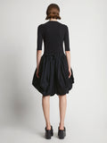 Back image of model wearing Technical Nylon Skirt in black