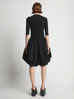 Back image of model wearing Technical Nylon Skirt in black