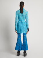 Back image of model wearing Lace Pants in turquoise