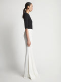 Side image of model wearing Viscose Tuxedo Stripe Pants in off white multi