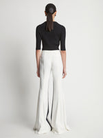 Back image of model wearing Viscose Tuxedo Stripe Pants in off white multi