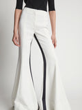 Detail image of model wearing Viscose Tuxedo Stripe Pants in off white multi