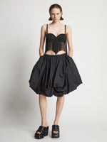 Front image of model wearing Technical Nylon Fringe Bra in black
