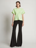 Front image of model wearing Eco Cotton Waisted T-Shirt in lime