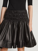 Detail image of model wearing Nappa Skirt in black