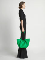Image of model wearing Large Ruched tote in BOTTLE GREEN