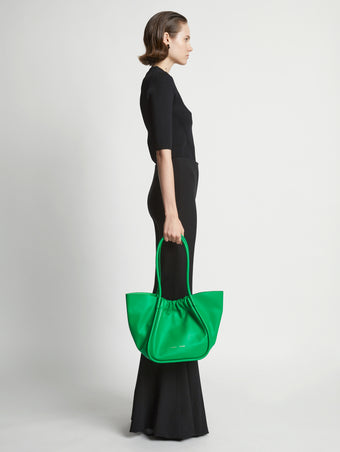 Image of model wearing Large Ruched tote in BOTTLE GREEN