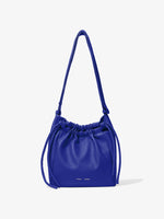 Front image of Drawstring Pouch in COBALT with strap extended