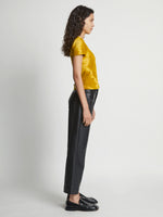 Side image of model wearing Tie Dye T-Shirt in sulphur/muted lime