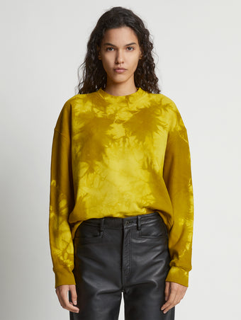 Cropped front image of model wearing Tie Dye Sweatshirt in sulphur/muted lime
