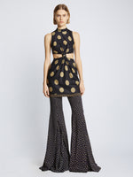 Front image of model wearing Printed Dot Cady Top in khaki multi