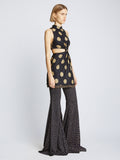 Side image of model wearing Printed Dot Cady Top in khaki multi