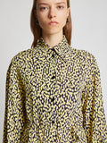 Detail image of model wearing Printed Leopard Shirt Dress in butter multi