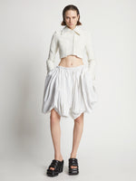 Front image of model wearing Technical Nylon Skirt in off white