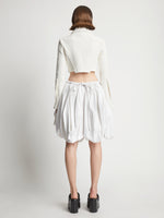 Back image of model wearing Technical Nylon Skirt in off white